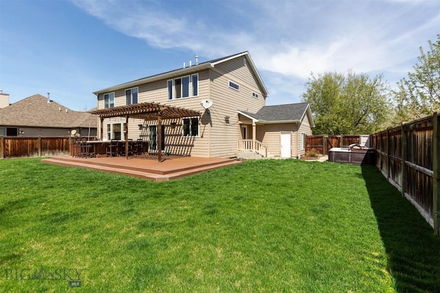 rear view of house featuring a pergola and a deck