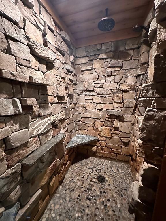 28 Loch Leven Rd, Livingston, MT 59047 - bathroom featuring a tile shower and wood ceiling