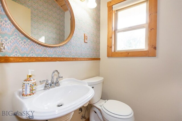 28 Loch Leven Rd, Livingston, MT 59047 - bathroom featuring a sink, wallpapered walls, and toilet