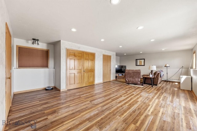 517 W Daly, Walkerville, MT 59701 - living area with light wood finished floors, recessed lighting, and baseboards