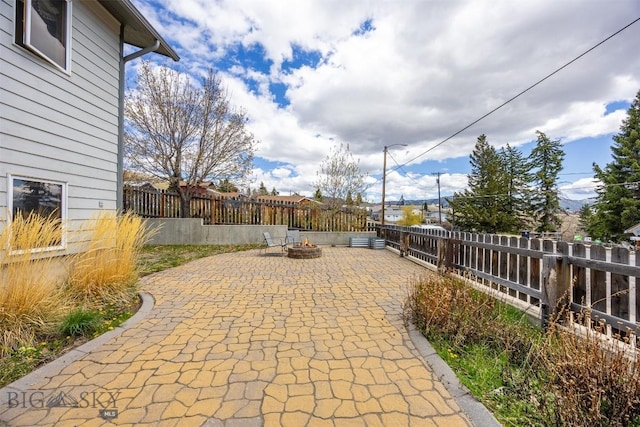 517 W Daly, Walkerville, MT 59701 - view of patio / terrace with a fire pit and a fenced backyard