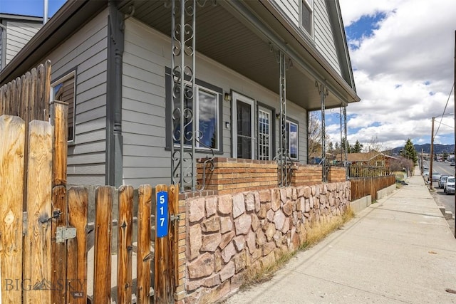 517 W Daly, Walkerville, MT 59701 - view of side of property with fence and a porch