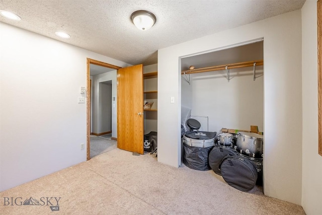 517 W Daly, Walkerville, MT 59701 - bedroom featuring carpet flooring, a closet, a textured ceiling, and recessed lighting