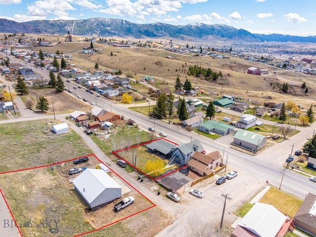 517 W Daly, Walkerville, MT 59701 - aerial view of residential area featuring property parcel outlined and a mountain backdrop