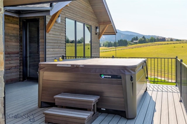 419 Upper Autumn Ridge Rd, Bozeman, MT 59715 - wooden terrace with a hot tub, a mountain view, and a view of countryside