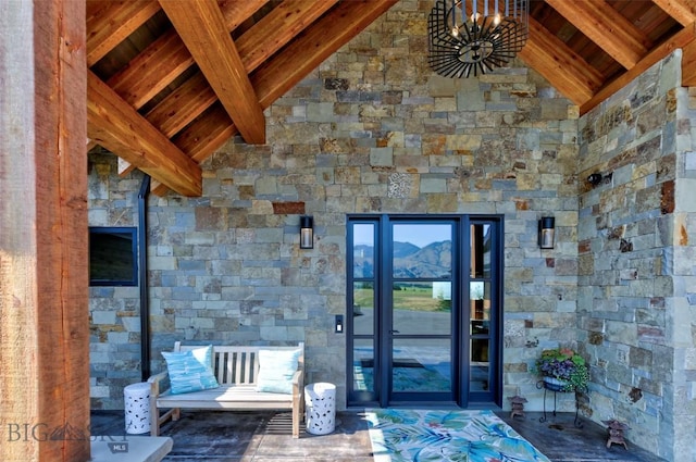 419 Upper Autumn Ridge Rd, Bozeman, MT 59715 - doorway to property featuring stone siding and a mountain view