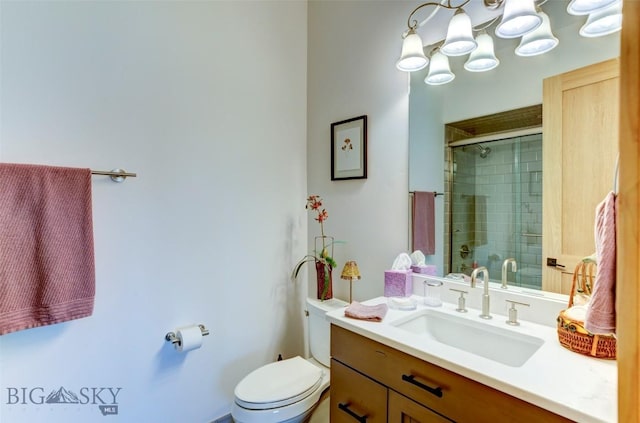 419 Upper Autumn Ridge Rd, Bozeman, MT 59715 - full bathroom with vanity, a tile shower, and toilet