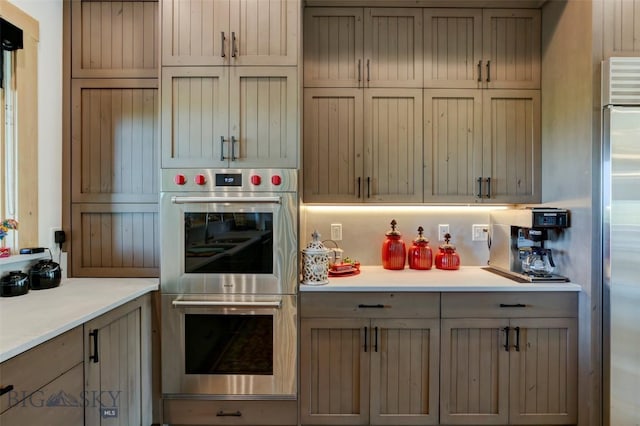 419 Upper Autumn Ridge Rd, Bozeman, MT 59715 - kitchen with appliances with stainless steel finishes, light countertops, and gray cabinets