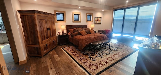 419 Upper Autumn Ridge Rd, Bozeman, MT 59715 - bedroom with wood finished floors, recessed lighting, and access to exterior