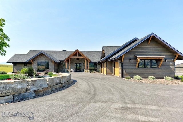 419 Upper Autumn Ridge Rd, Bozeman, MT 59715 - view of front of property featuring stone siding