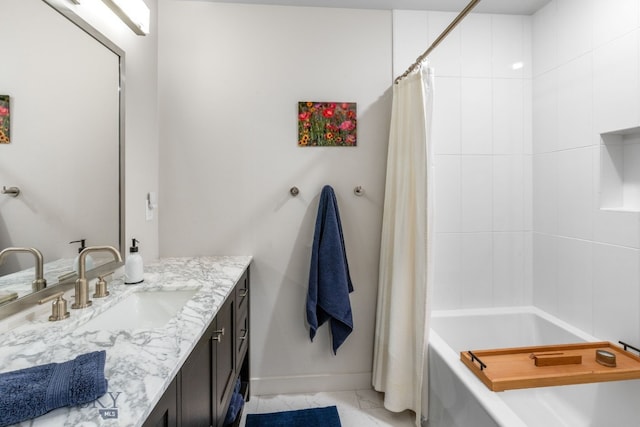 20 Prairie Falcon Ln, Belgrade, MT 59714 - full bath featuring baseboards, vanity, and shower / tub combo
