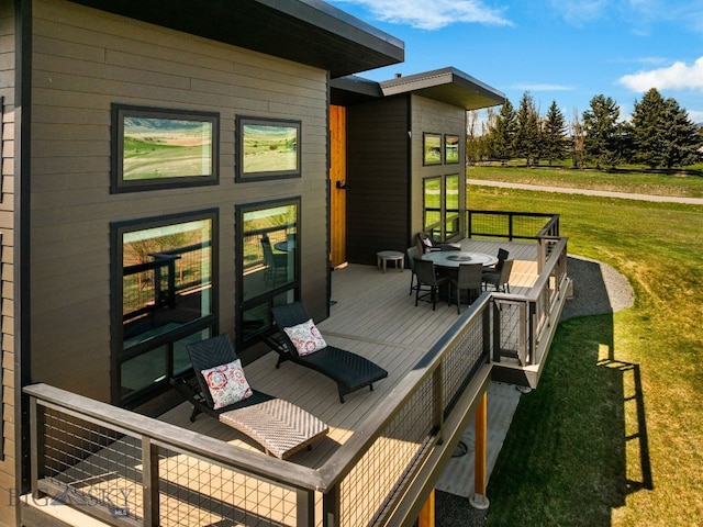 20 Prairie Falcon Ln, Belgrade, MT 59714 - wooden deck with a yard and outdoor dining space
