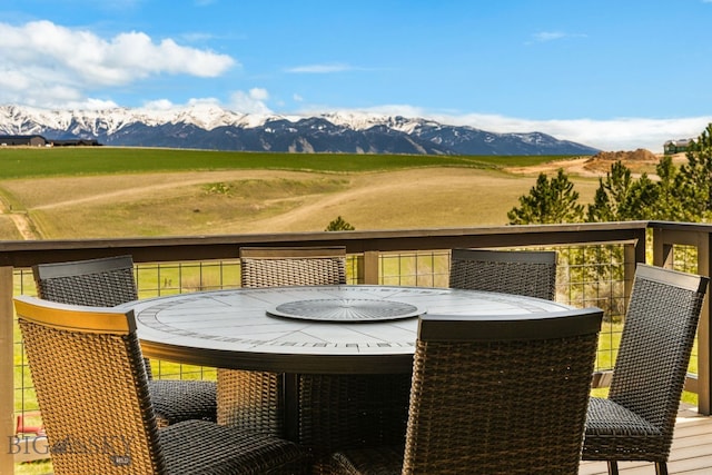 20 Prairie Falcon Ln, Belgrade, MT 59714 - balcony featuring a mountain view and outdoor dining area