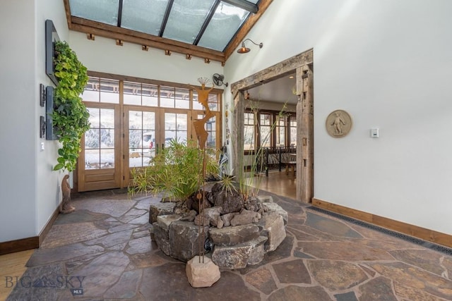 unfurnished sunroom featuring french doors