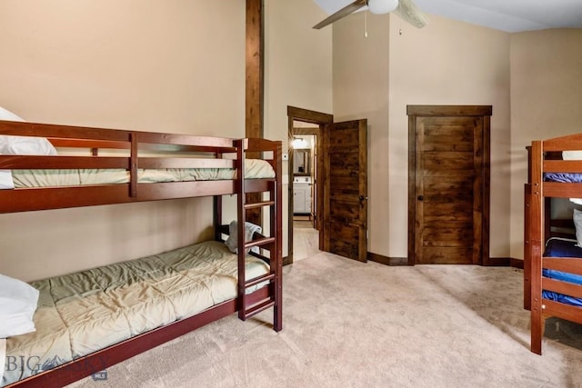 bedroom featuring carpet and baseboards