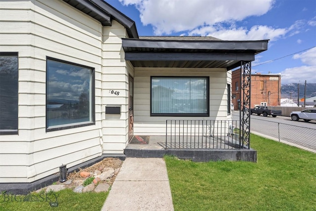 1048 S Wyoming St, Butte, MT 59701 - view of exterior entry featuring a porch
