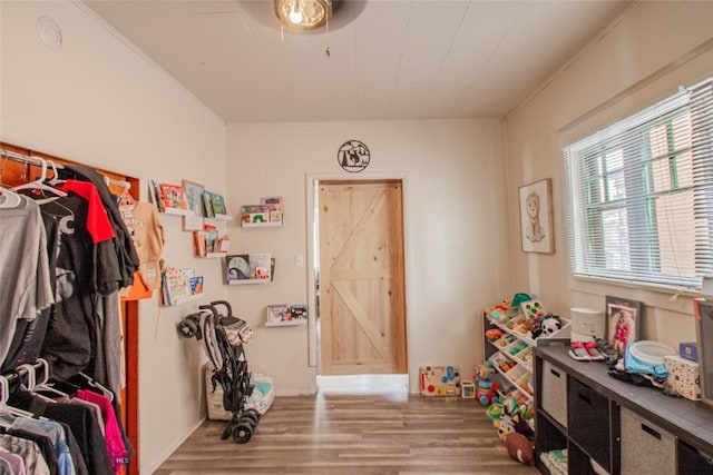 1048 S Wyoming St, Butte, MT 59701 - rec room with wood finished floors and plenty of natural light