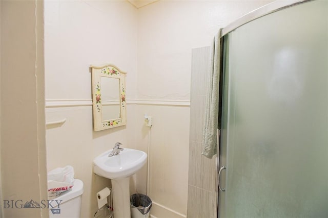 1048 S Wyoming St, Butte, MT 59701 - bathroom featuring a stall shower and toilet