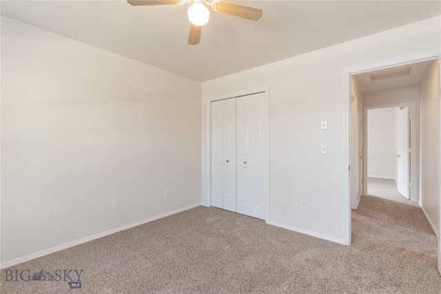 550 Green Tree, Belgrade, MT 59714 - unfurnished bedroom with carpet flooring, baseboards, a closet, and a ceiling fan