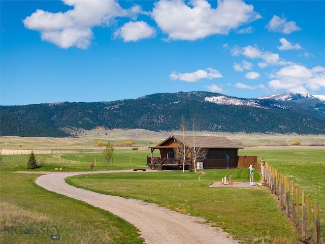 view of mountain background featuring rural landscape
