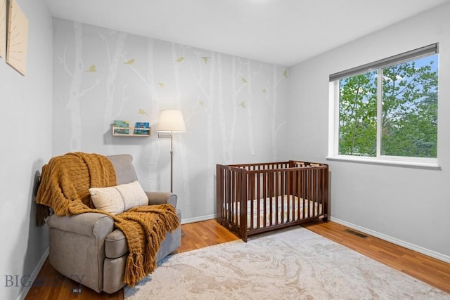 285 Hereford Dr, Belgrade, MT 59714 - bedroom featuring wood finished floors and baseboards