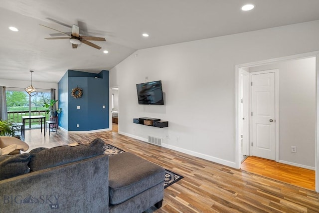 285 Hereford Dr, Belgrade, MT 59714 - living area featuring ceiling fan, wood finished floors, baseboards, lofted ceiling, and recessed lighting
