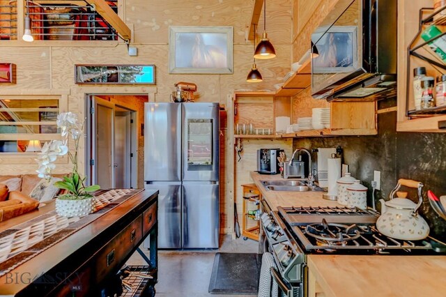 1007 E Geyser, Livingston, MT 59047 - kitchen with smart refrigerator, a sink, black microwave, and finished concrete floors