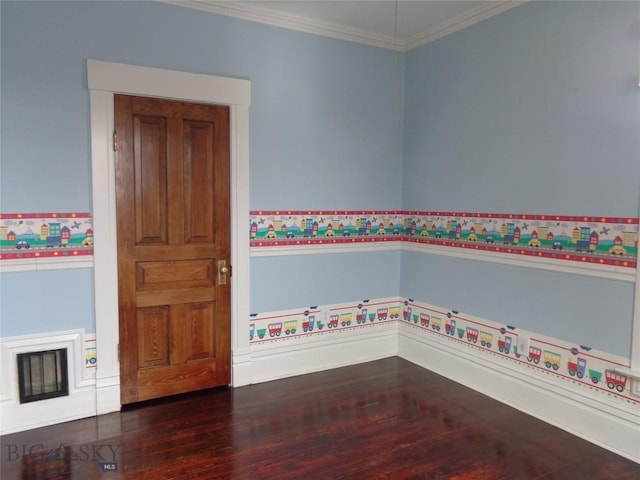 523 Hickory, Anaconda, MT 59711 - spare room with wood finished floors, crown molding, and wainscoting