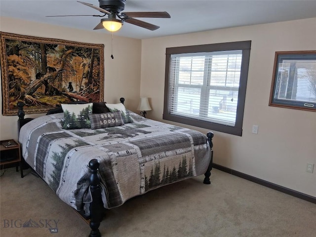 967 Mt Highway 2 W, Whitehall, MT 59759 - bedroom with carpet flooring, baseboards, and ceiling fan