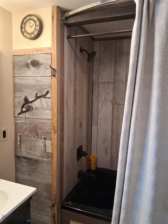 967 Mt Highway 2 W, Whitehall, MT 59759 - full bathroom featuring a shower with shower curtain and vanity