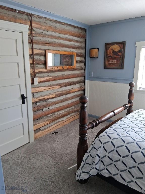 967 Mt Highway 2 W, Whitehall, MT 59759 - bedroom featuring carpet and a wainscoted wall