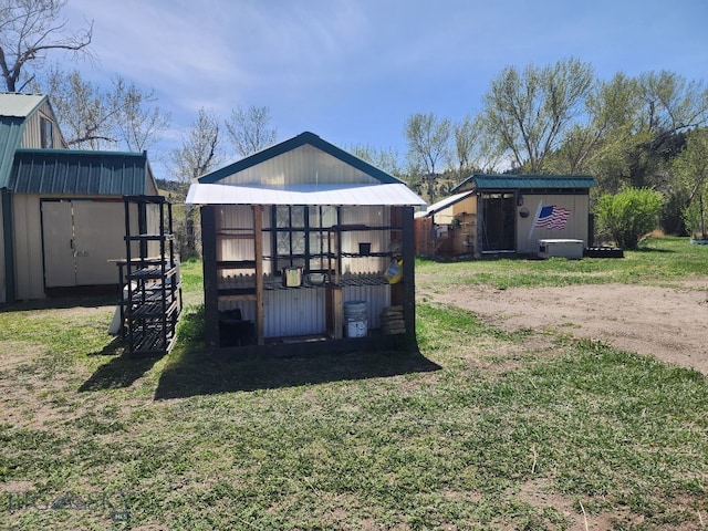 967 Mt Highway 2 W, Whitehall, MT 59759 - rear view of house featuring a yard