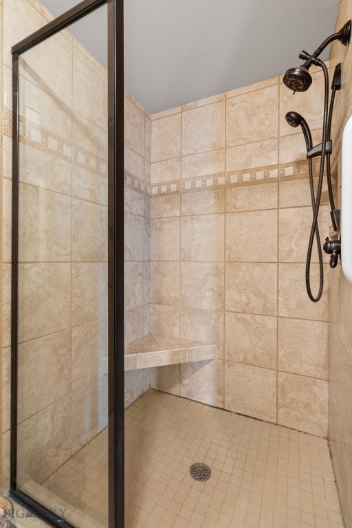 bathroom featuring a shower stall