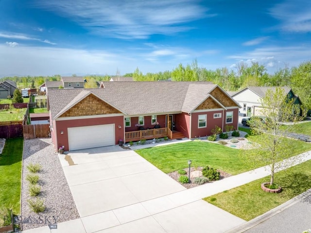 72 River Woods Rd, Belgrade, MT 59714 - single story home with a garage, a porch, concrete driveway, and roof with shingles