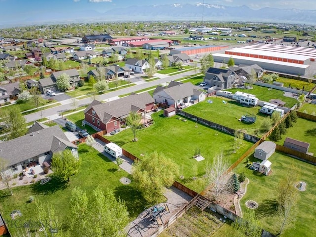 72 River Woods Rd, Belgrade, MT 59714 - aerial perspective of suburban area with mountains
