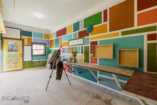 interior space featuring concrete floors