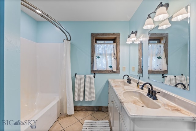 full bath featuring tile patterned flooring, shower / tub combo with curtain, and double vanity