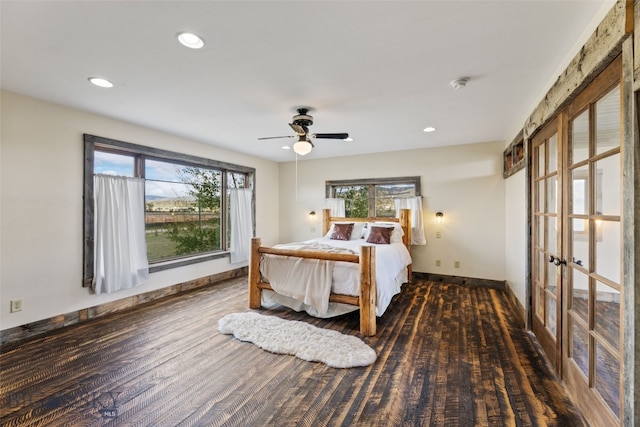 bedroom featuring wood finished floors, recessed lighting, baseboards, ceiling fan, and french doors
