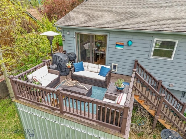 deck featuring outdoor lounge area and grilling area