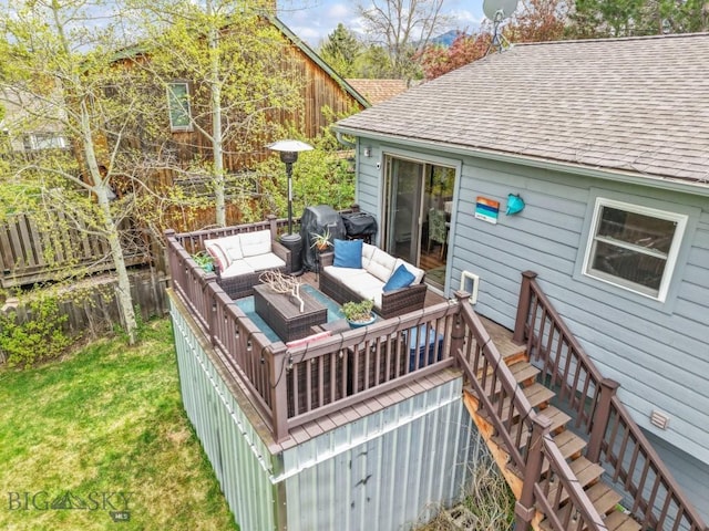 deck featuring an outdoor hangout area and stairs