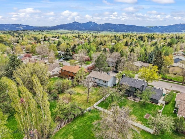 aerial view of residential area featuring a mountainous background