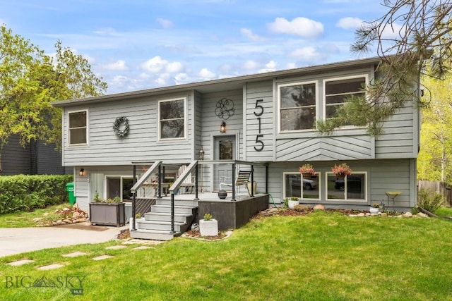 view of front of property with a front lawn