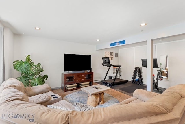 living area featuring recessed lighting and baseboard heating