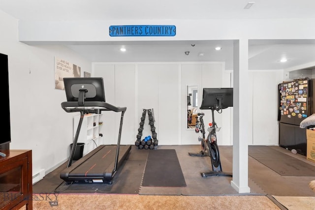 workout area with recessed lighting