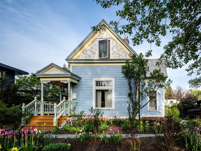 315 S Tracy Ave, Bozeman, MT 59715 - view of front facade featuring a chimney