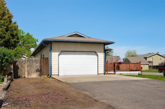 115 8th, Belgrade, MT 59714 - view of front of property with driveway, fence, and a shingled roof