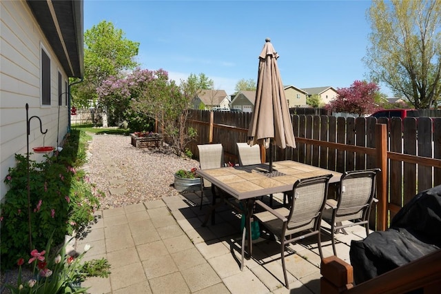 115 8th, Belgrade, MT 59714 - view of patio / terrace with a fenced backyard and outdoor dining space