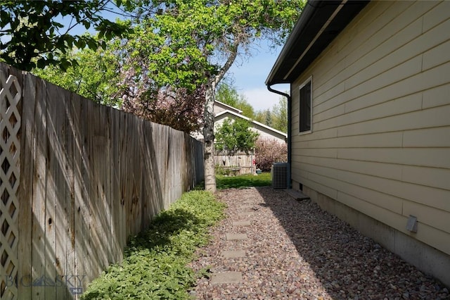 115 8th, Belgrade, MT 59714 - view of side of property with fence and central AC