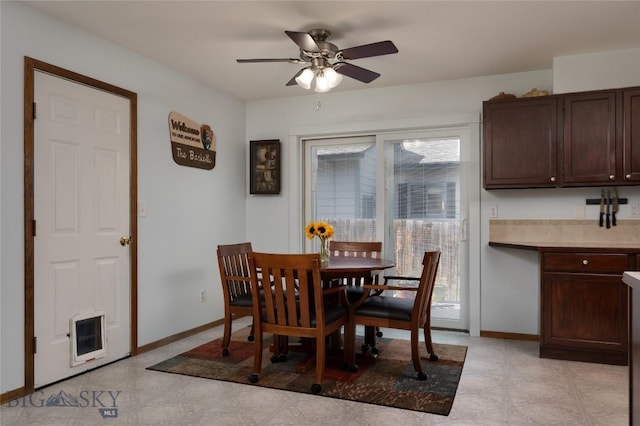 115 8th, Belgrade, MT 59714 - dining area featuring a ceiling fan and baseboards