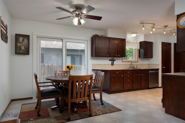 115 8th, Belgrade, MT 59714 - kitchen with dishwasher, a sink, dark brown cabinets, ceiling fan, and light floors